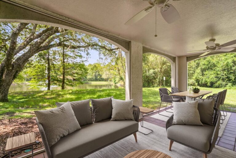 Relax outside in the shade on your beautiful patio at Mezzo of Tampa Palms apartments.