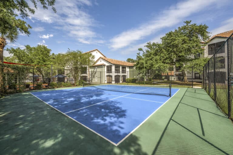 Mezzo of Tampa Palms Apartments tennis courts.
